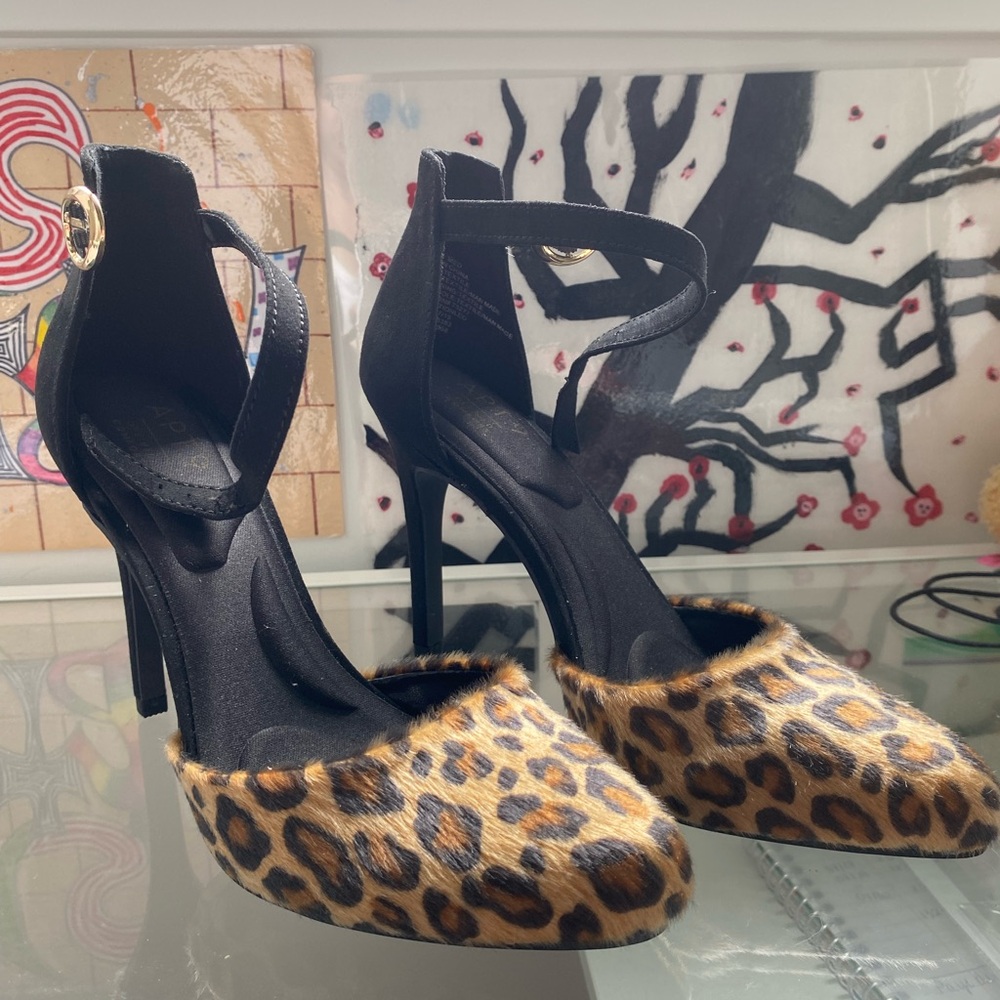 Never worn! Ultra feminine animal print heels.